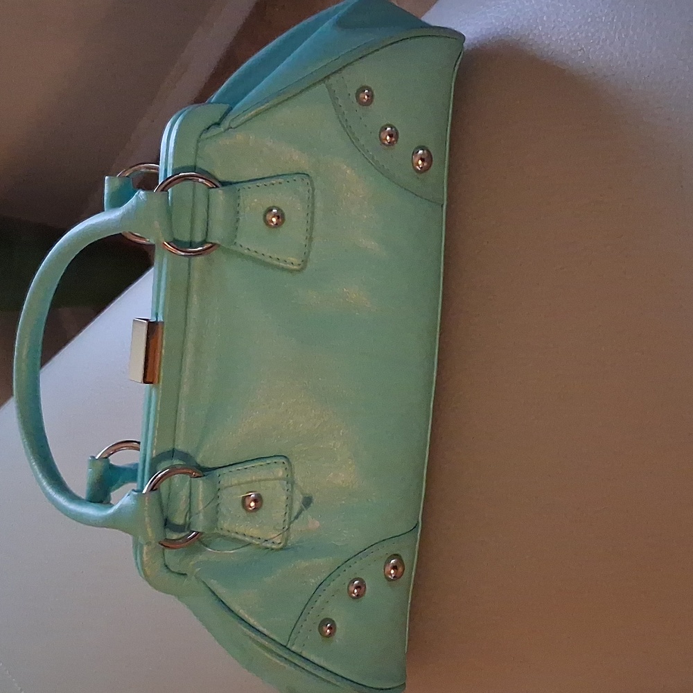 Elegant Wilson's Leather Maxima Aqua Handbag